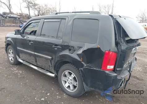 2009 Honda Pilot Touring z USA, uszkodzony, nr VIN 5FNYF489X9B027958
